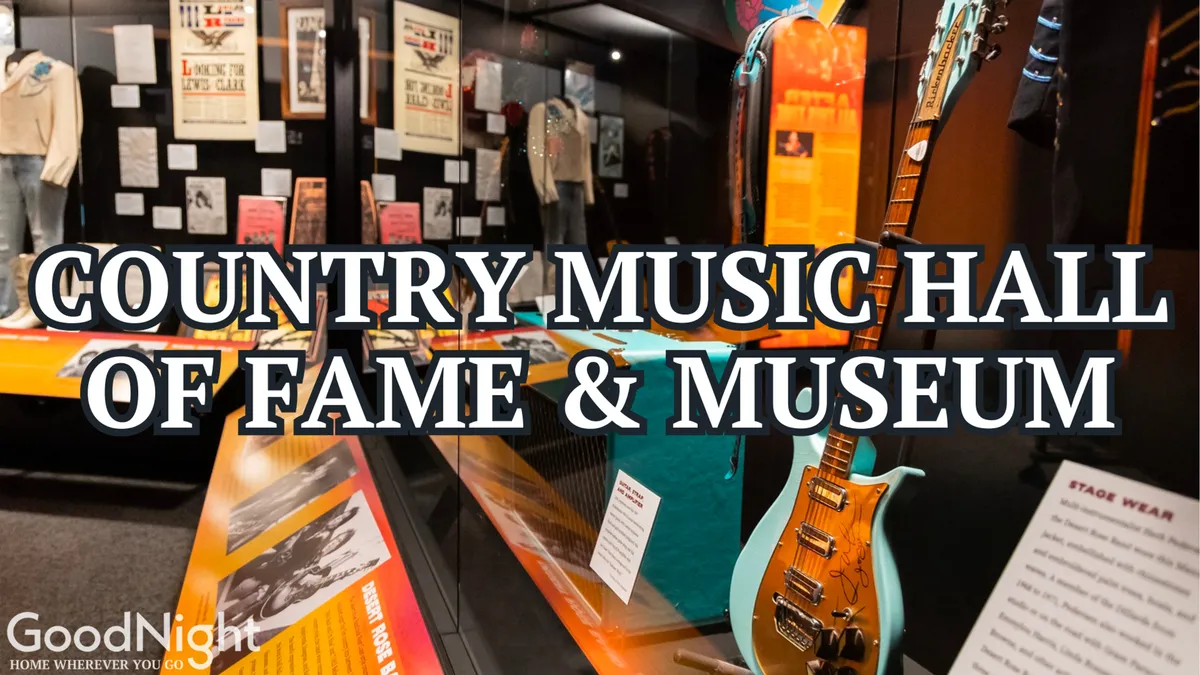 An interior scene showing engaging exhibits at the Country Music Hall of Fame, including stage wear, musical instruments, and informative plaques. The display is vibrant and nostalgic, inviting families to explore and learn together.